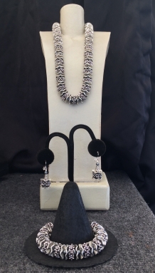 A. Chunky Silver Necklace, 15” to 22” $95 B. Earrings $28 C. Chunky Silver Bracelet $59
